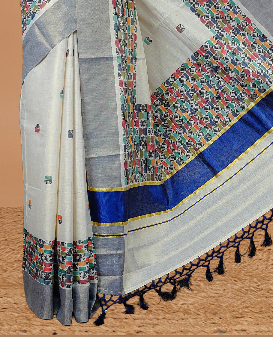 Cream colour Tissue kerala saree featuring Classy Multi colour Box pattern on body, Styled by navy blue & gold zari border and pallu, comes with matching blouse piece.