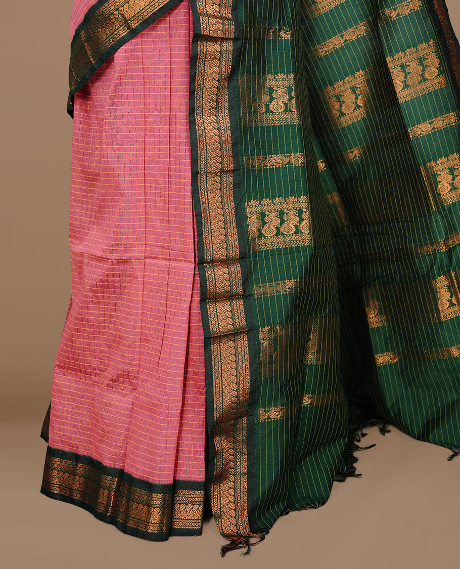 Pink colour kalyani cotton saree featuring gold zari check pattern on body, complemented by green colour with Antique zari border, paired with matching blouse piece.