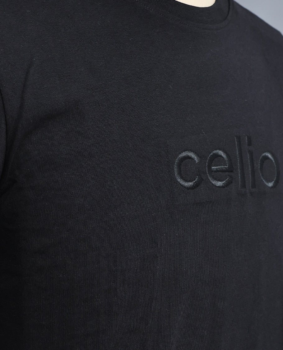 Black colour t shirt featuring round design neck, elegant Design body with a text, Half sleeve.