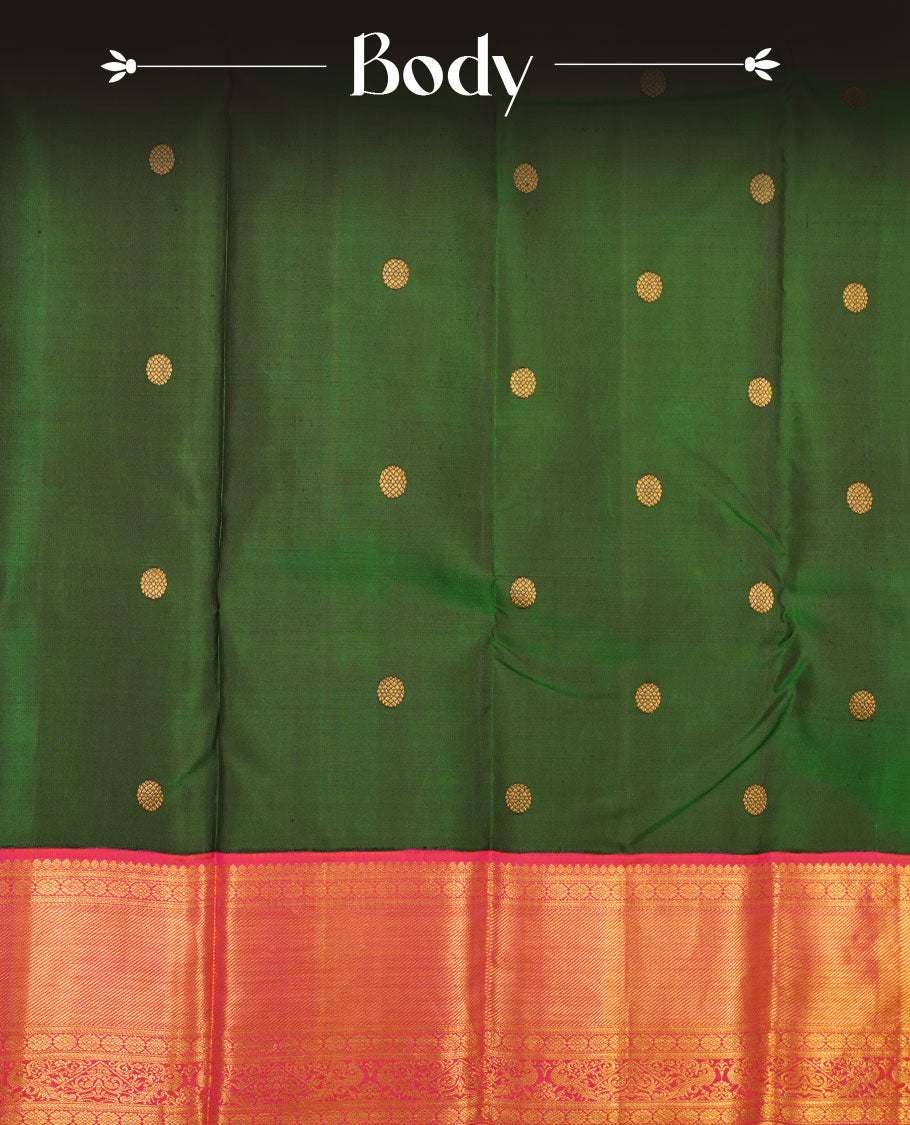 Bottle green colour pure traditional Kancheepuram silk saree adorned with gold zari motifs across the body, featuring elegant contrast orange traditional borders, beautifully paired with a matching blouse piece.