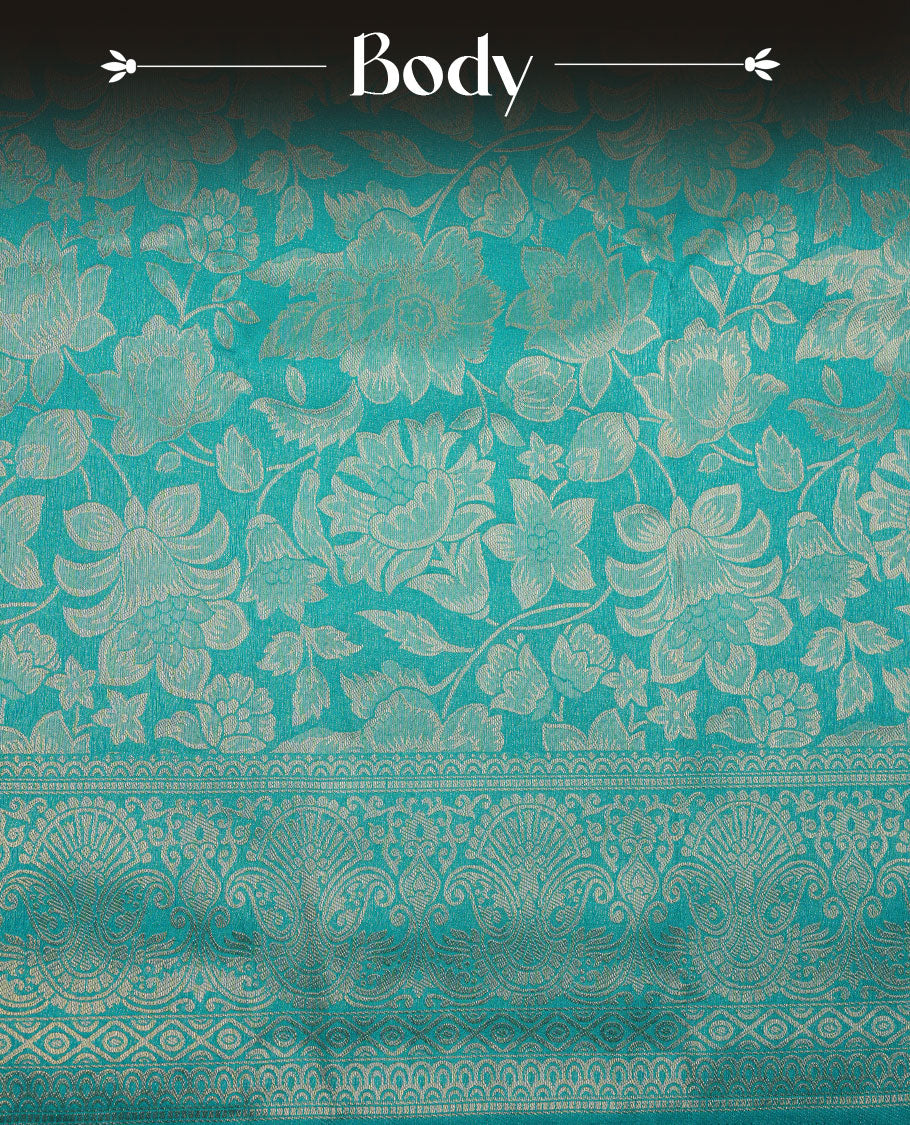 Teal green colour semi soft silk brocade saree featuring elegant self-woven floral motifs on the body, finished with an intricately detailed matching border and pallu, paired with a coordinated blouse piece.