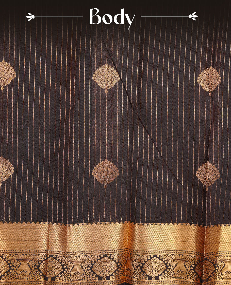 Dark chocolate colour soft silk saree featuring Gold zari stripes & motifs on body, complemented by self colour with traditional border, paired with matching blouse piece.