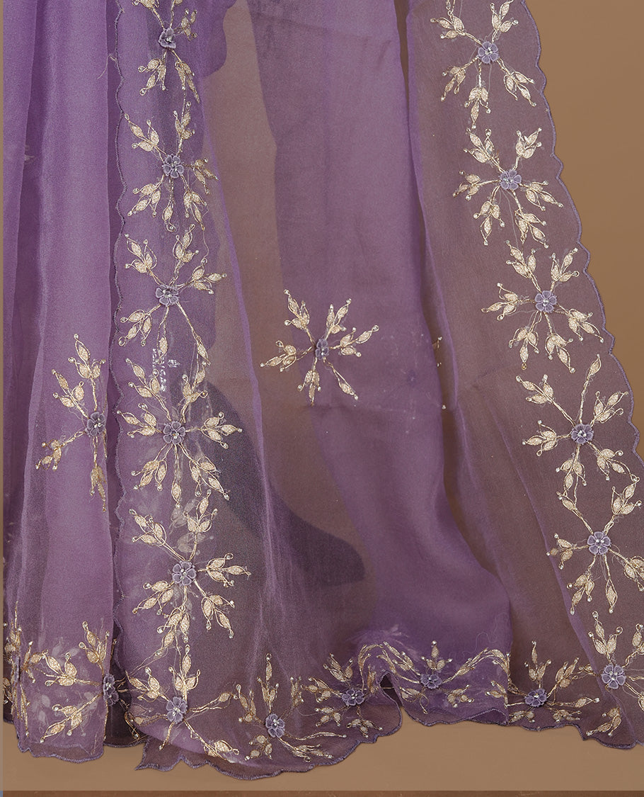 Pastel purple colour crush organza saree featuring gold thread floral and stone worked body, highlighting scalp designed border, paired with matching blouse piece.