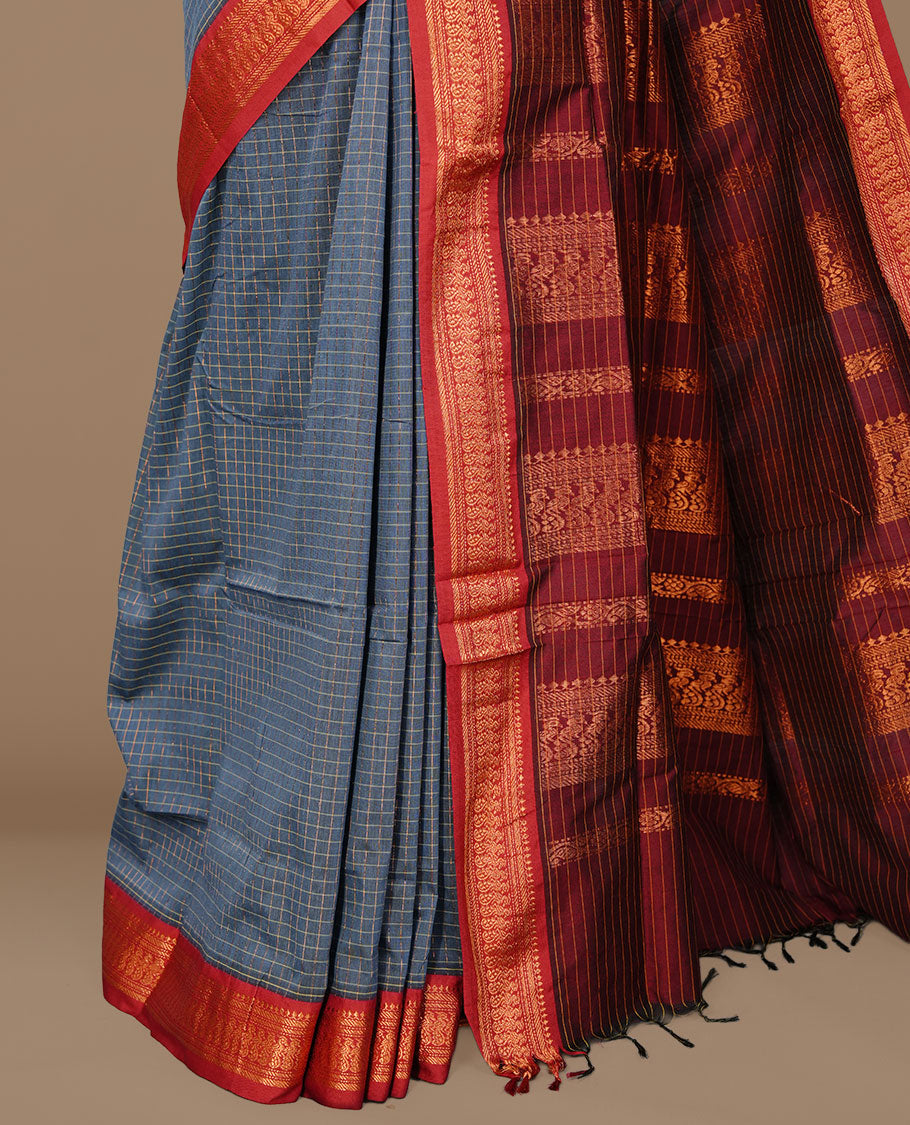 Teal colour kalyani cotton saree featuring antique zari motifs on body, complemented by Maroon colour with Antique zari border, paired with matching blouse piece. (Copy)