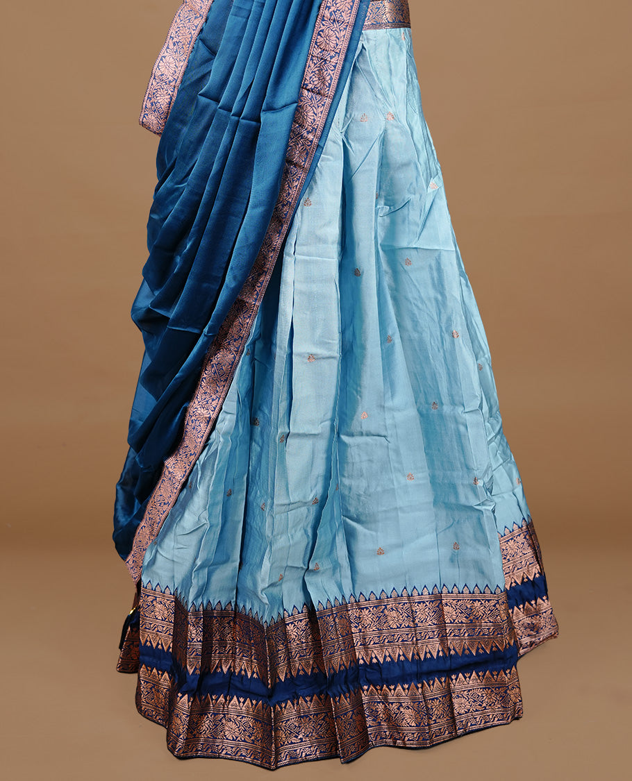 Aqua colour semi stitched Half saree featuring contrast Dark teal colour with antique zari traditional border skirt, paired with matching zari border dupatta, unstitched blouse piece