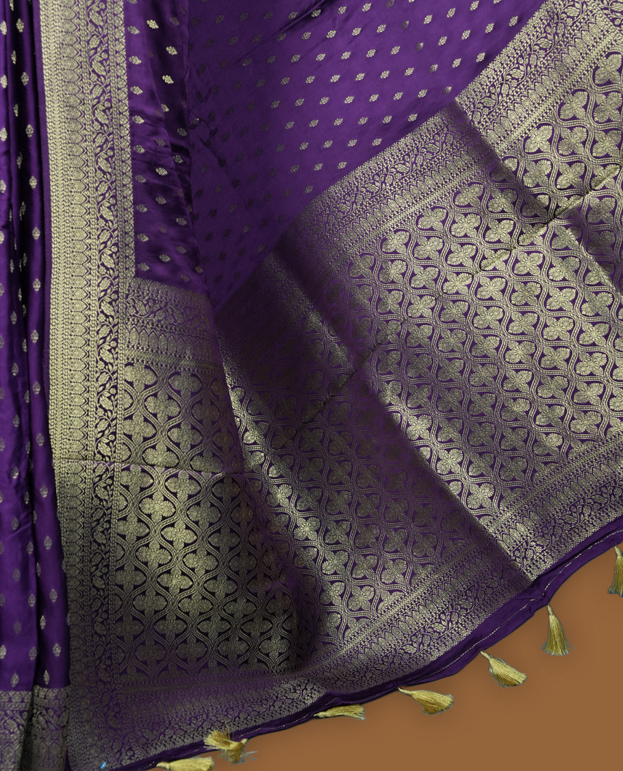 Navy Blue Colour Semi Banarasi Satin Crepe Saree with Silver Zari Buti Motifs, Traditional Gold Ornamental Pallu, Elaborate Woven Border, Decorative Tassels with Matching Blouse