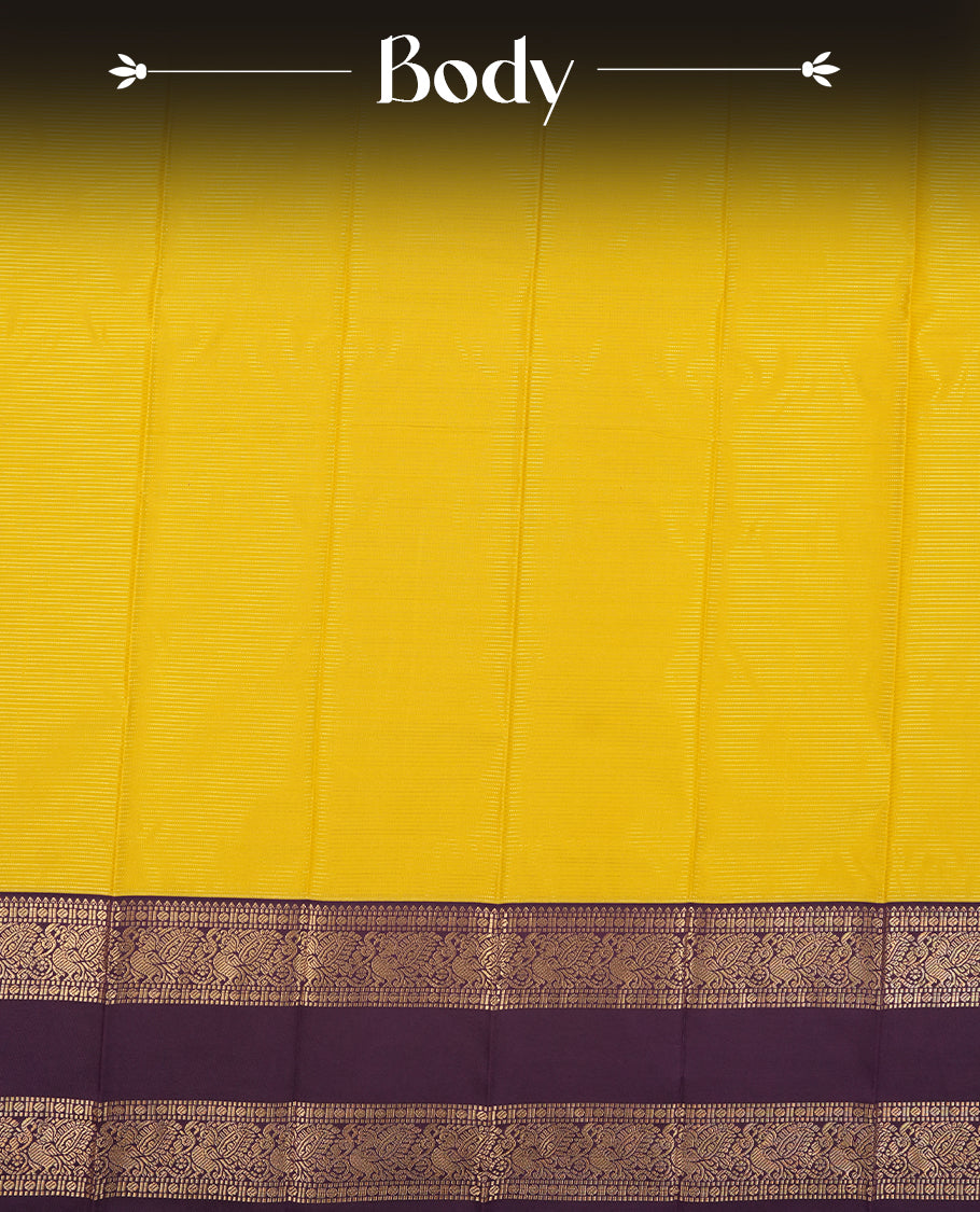 Olive yellow colour Semi Silk Saree with gold zari striped patterns on the body, paired with a contrasting Dark purple traditional pallu and border, and a matching blouse piece.