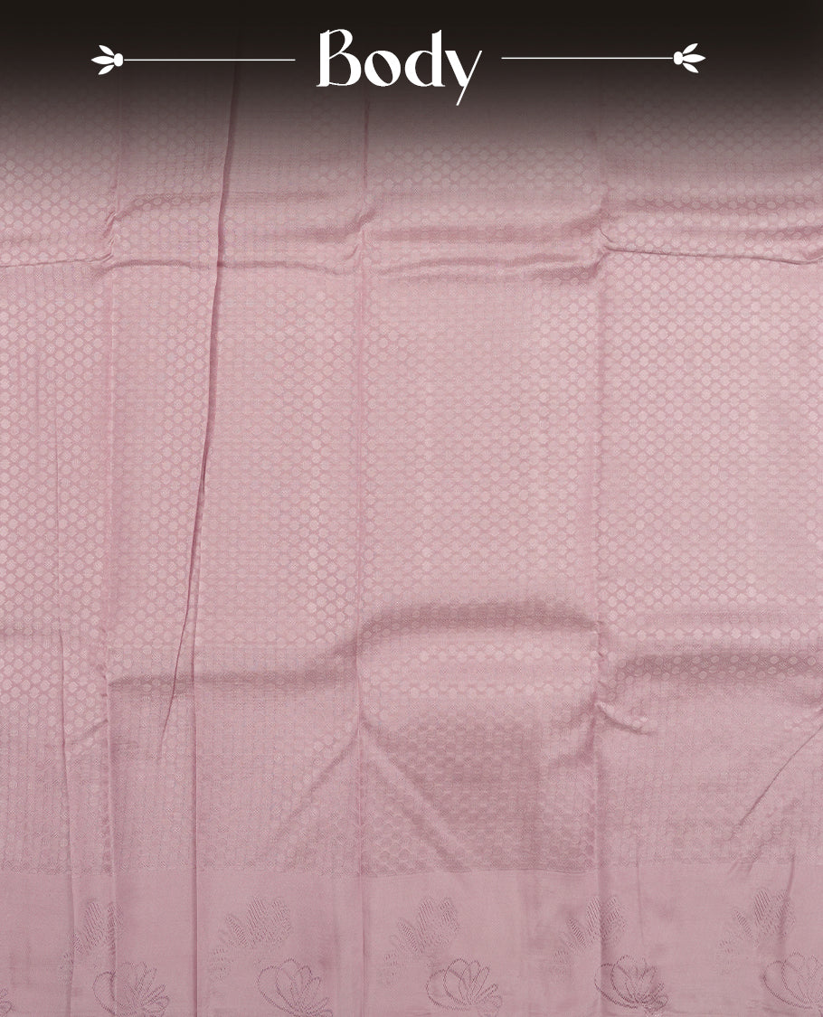 pastel purple colour semi-soft silk saree featuring a self coloured textured patterned body, complemented by self coloured motifs on pallu & border and a matching blouse piece.