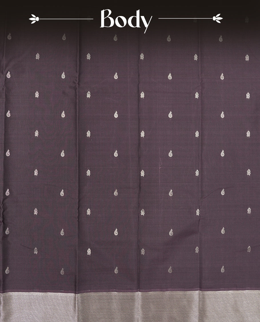 Purple taupe colour semi soft silk saree featuring a gold peacock & floral motifs body, complemented by gold traditional pallu & border and a matching blouse piece.