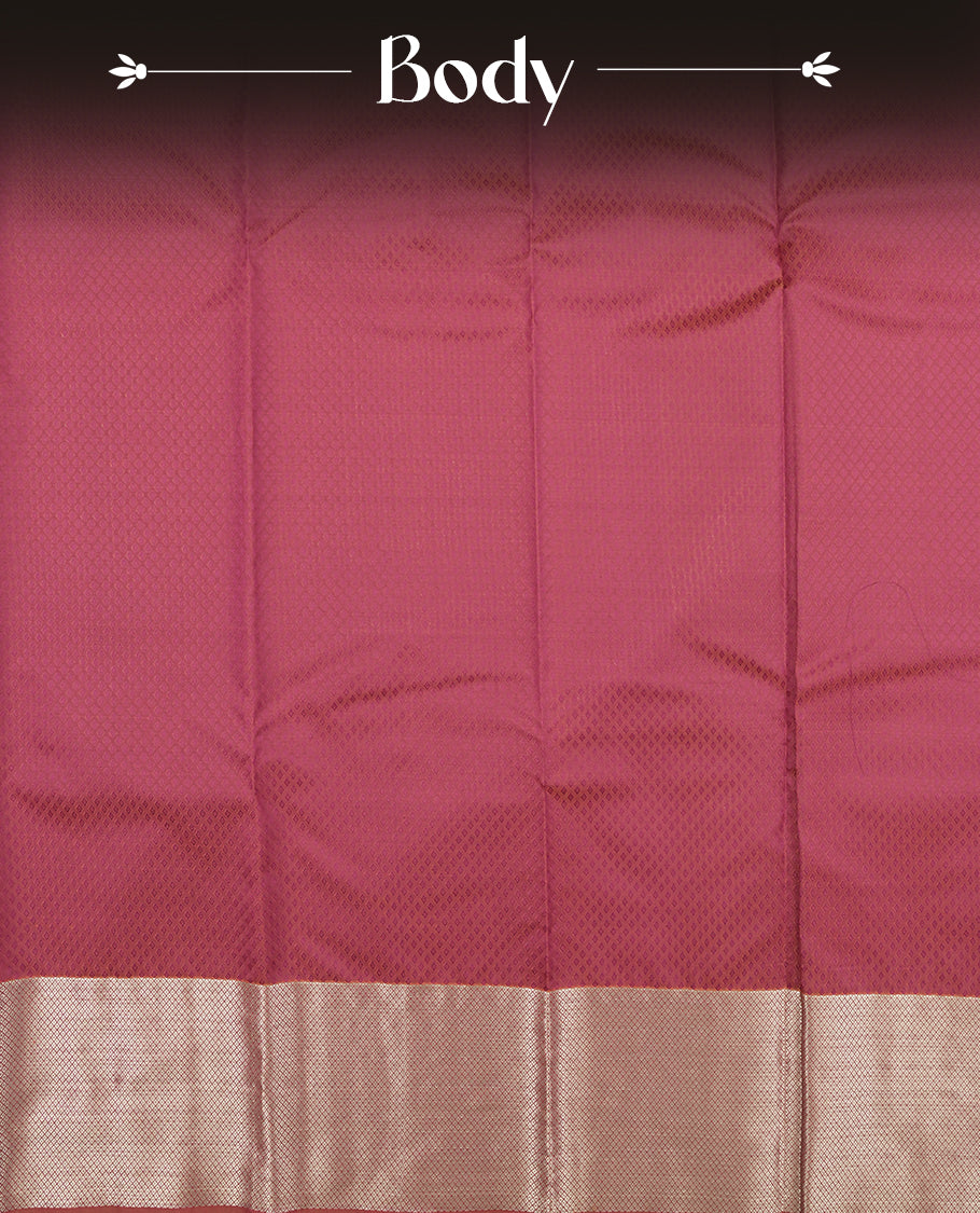 Dark magenta colour semi soft silk saree featuring a self coloured textured patterned body, complemented by self coloured golden tiny diamond motifes on pallu & border and a matching blouse piece.