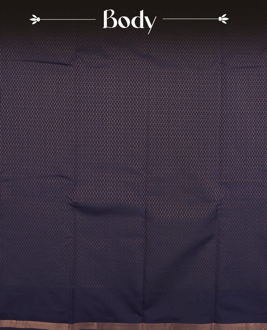 Navy blue colour semi soft silk saree featuring a gold short line patterned body, complemented by pallu & gold border and a matching blouse piece.