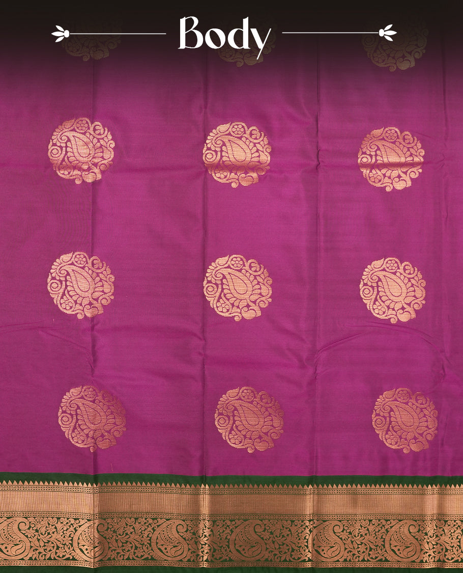 Dark Purple colour Semi Silk Saree with gold zari motifs on the body, paired with a contrast Dark green colour pallu with gold zari traditioal border, and a matching blouse piece.