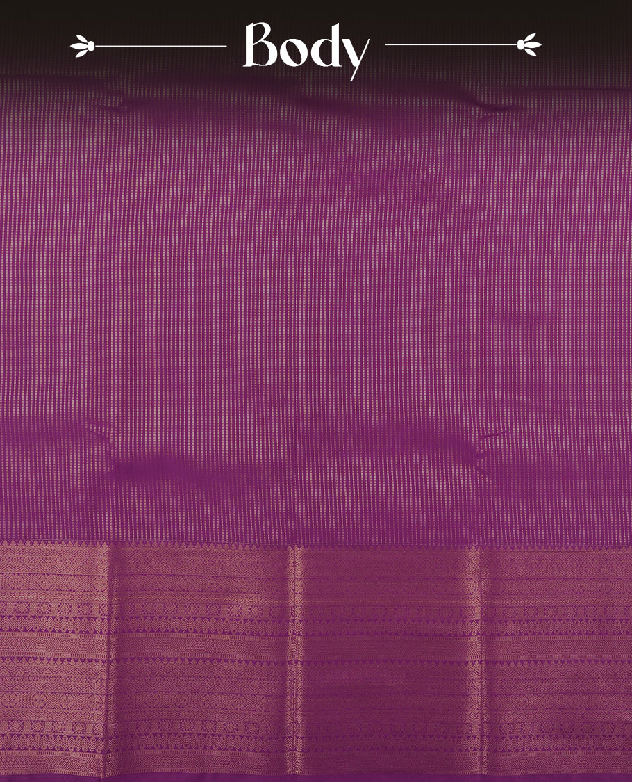 Dark Purple colour Semi Silk Saree with gold zari stripes on the body, paired with a contrast rani pink colour pallu with self colour gold zari traditioal border, and a matching blouse piece.