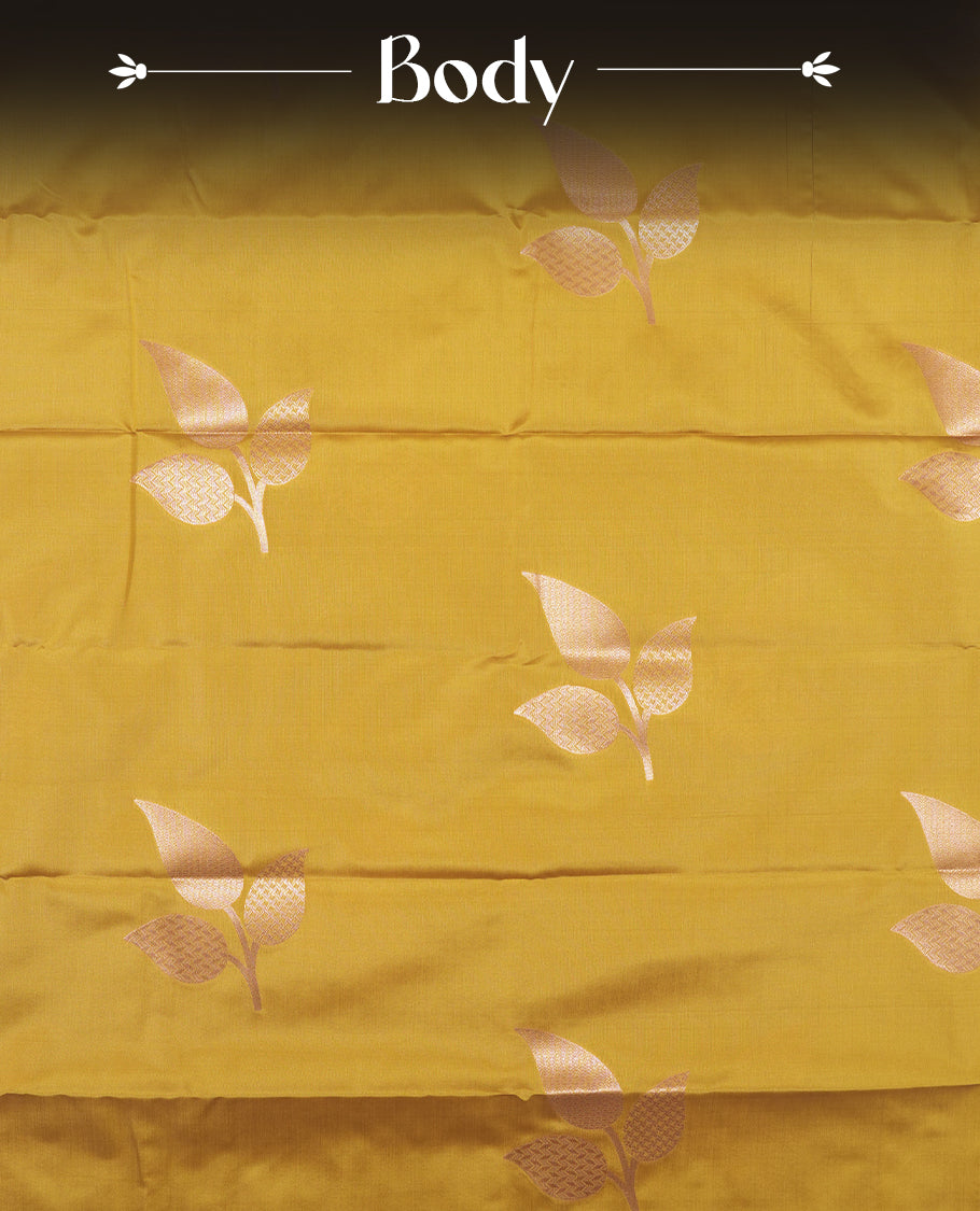 Mustard Yellow Semi Silk Saree with Matching Zari Woven Pallu and Border Featuring Subtle Floral Patterns, Tassel Detailing, and Coordinated Blouse Piece