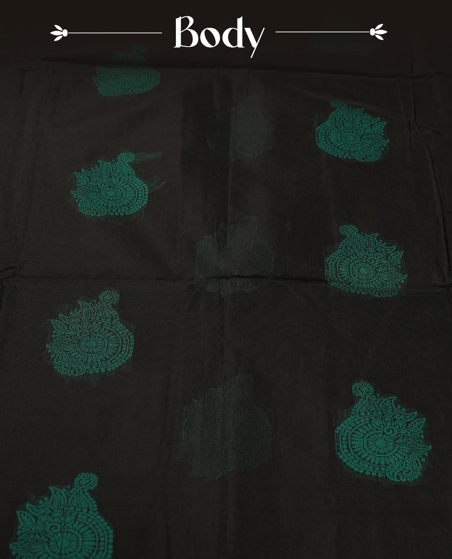 Black colour soft silk cotton saree adorned with peacock colour motifs and Enhanced by a beautifully rich peacock colour woven contrasted pallu & Comes with a matching blouse piece for a complete look.