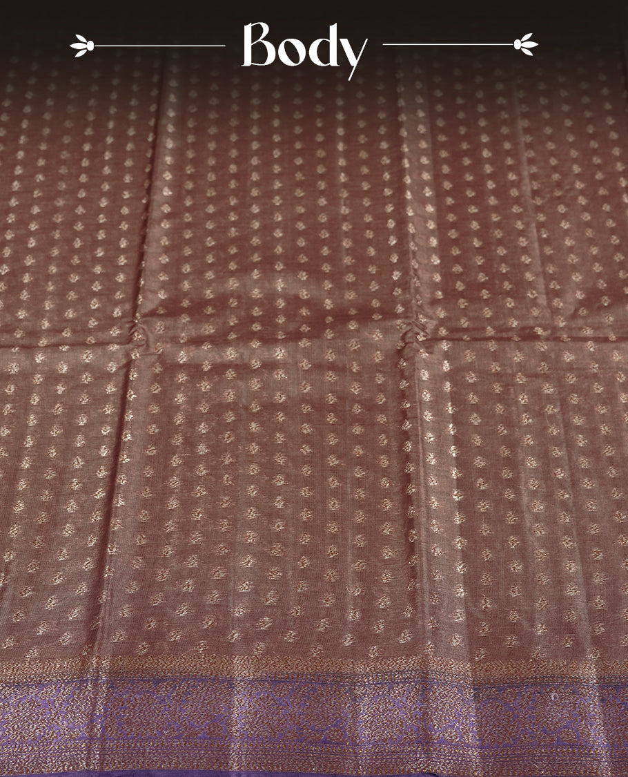 Brown pure banarasi tussar saree featuring fine silver zari motifs across the body, accentuated with an elegant contrast purple Banarasi border & Paired with a matching blouse piece.