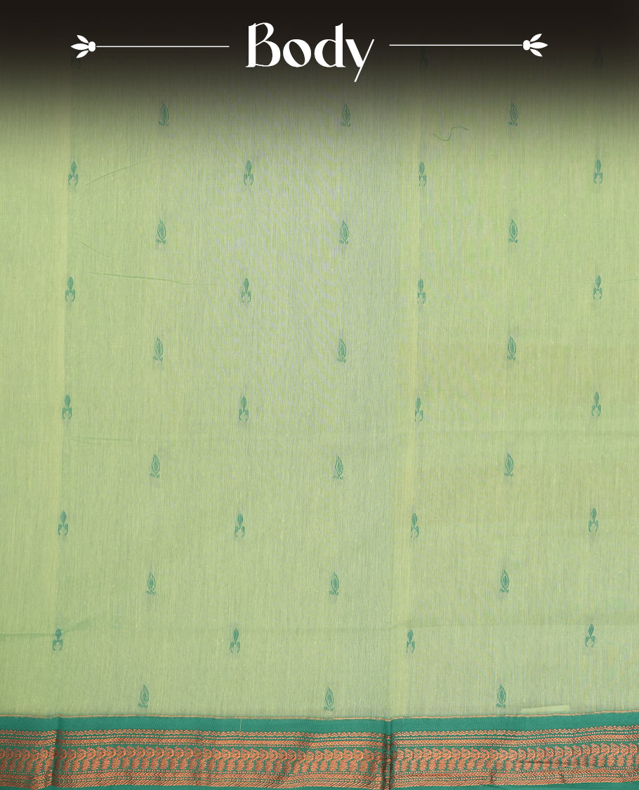Mint green colour Kalyani cotton saree with subtle zari motifs all over, paired with a contrasting teal green rich copper zari woven border and pallu & Comes with a matching blouse piece.