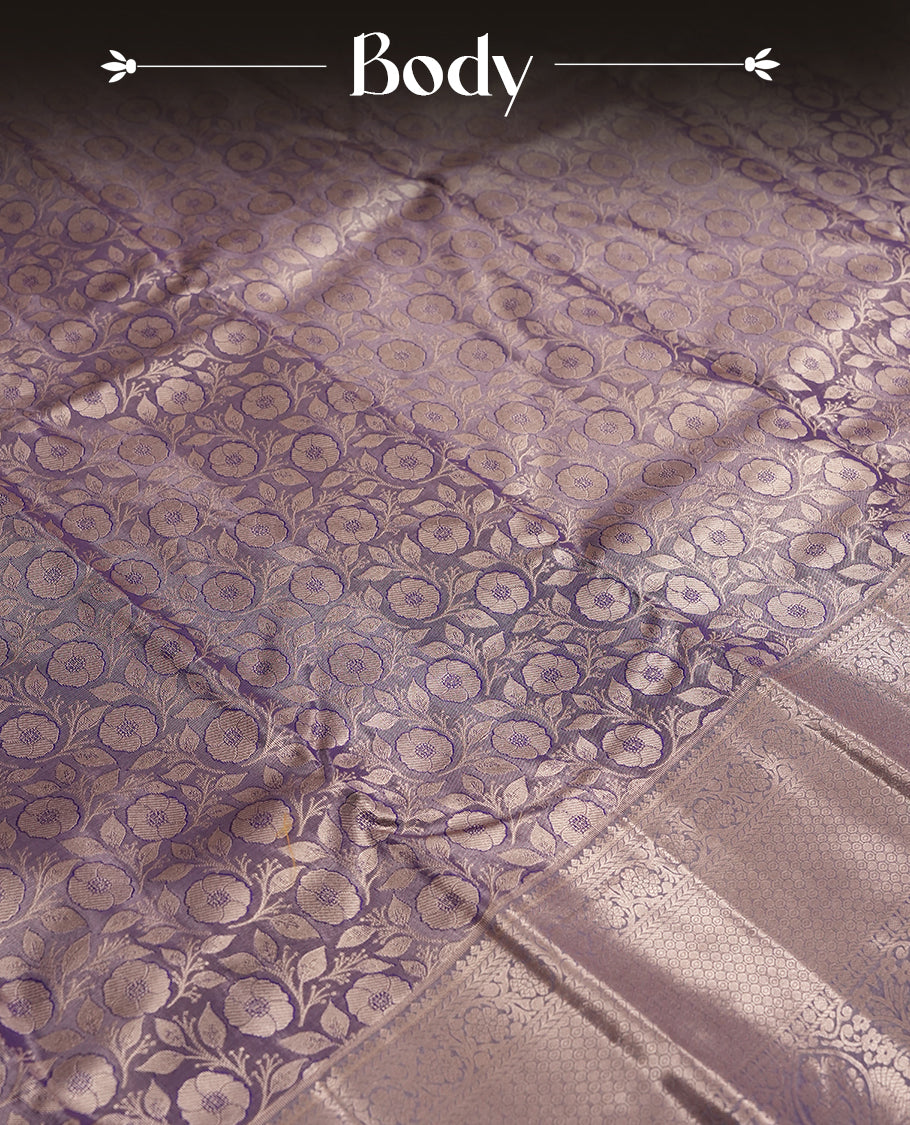 Purple colour and Antique silver Zari Tissue Brocade Saree features intricate Motifs on body and traditional border & pallu with floral patterns, paired with matching blouse