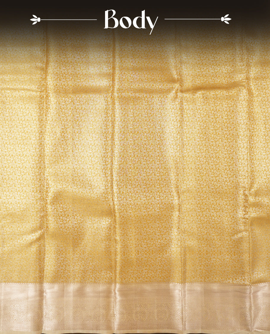 Golden colour and silver Zari Tissue Brocade Saree features intricate Motifs on body and rose gold colour traditional border & pallu, paired with matching blouse