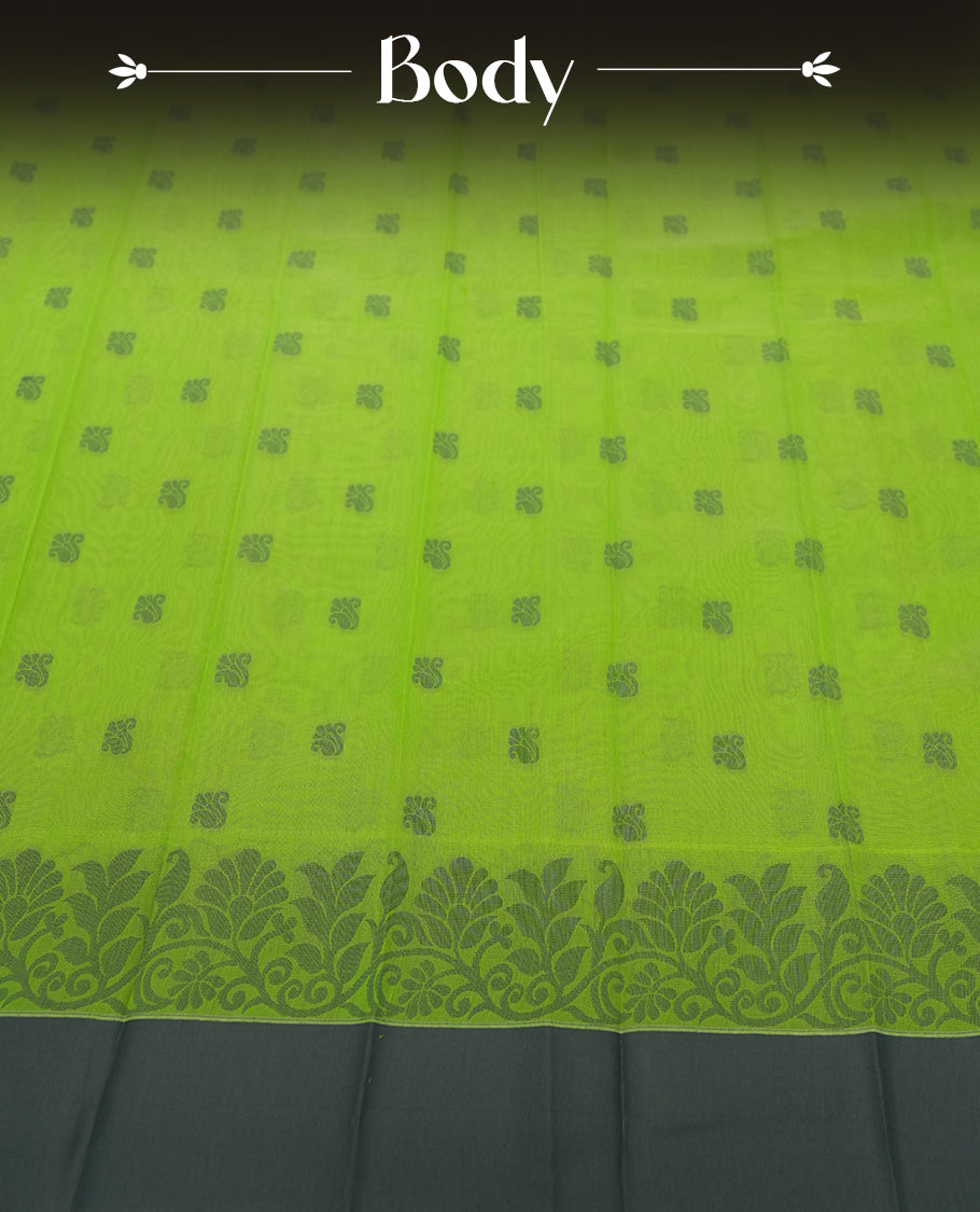 Lemon green colour silk cotton saree featuring elegant floral zari motifs on the body, complemented by a rich contrast dark border and pallu with traditional woven detailing & Comes with a matching blouse piece.
