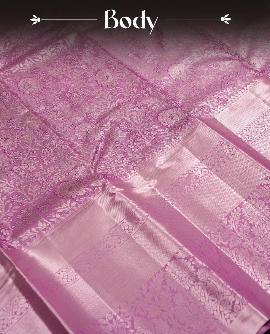 Lavender magenta and Antique silver Zari Tissue Brocade Saree features intricate floral Motifs on body and rose gold colour traditional border & pallu with floral patterns, paired with matching blouse