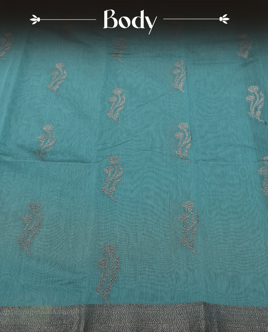 Teal Colour Silk Cotton Saree with Silver Floral Butta Body, Contrasting Silver Zari Pallu & Border, Floral Vine Motifs, and Matching Plain Woven Blouse Piece