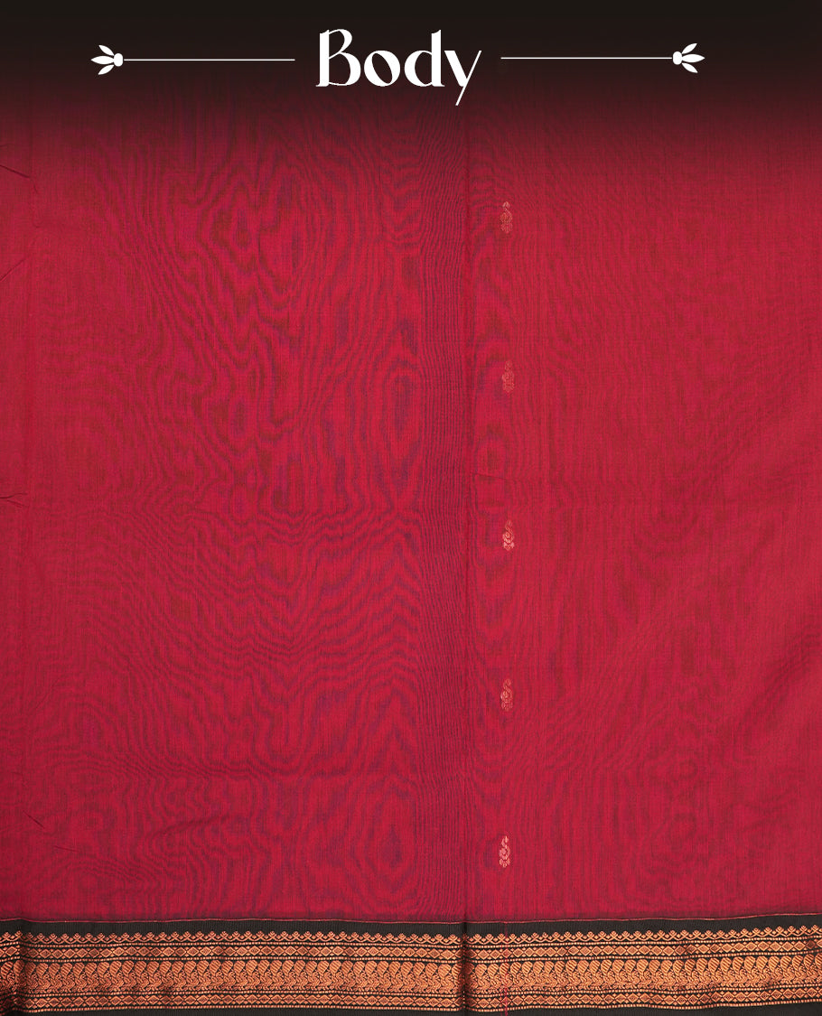 Maroon colour Kalyani cotton saree with subtle zari motifs all over, paired with a contrasting black rich copper zari woven border and pallu & Comes with a matching blouse piece.