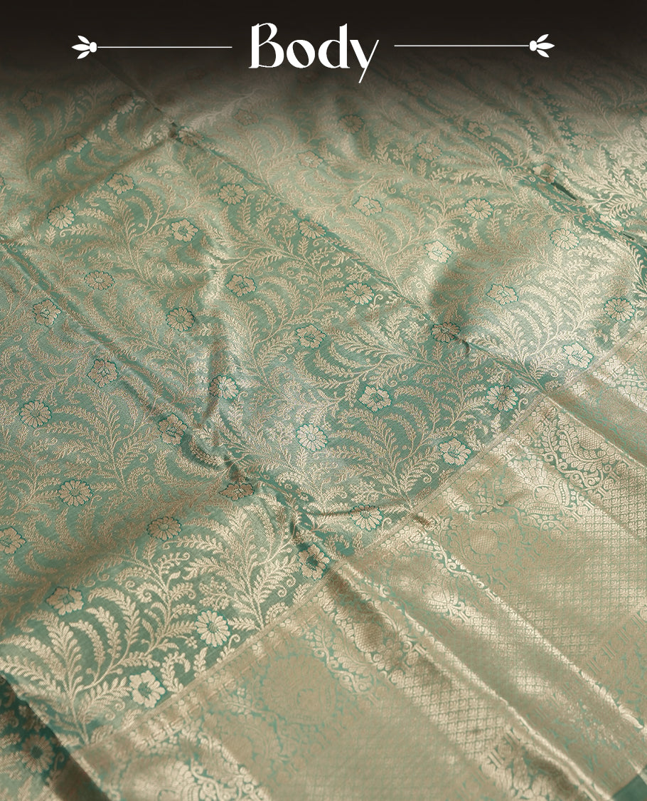 Seafoam green and Antique gold Zari Tissue Brocade Saree features intricate floral Motifs on body and traditional border & pallu with floral patterns, paired with matching blouse