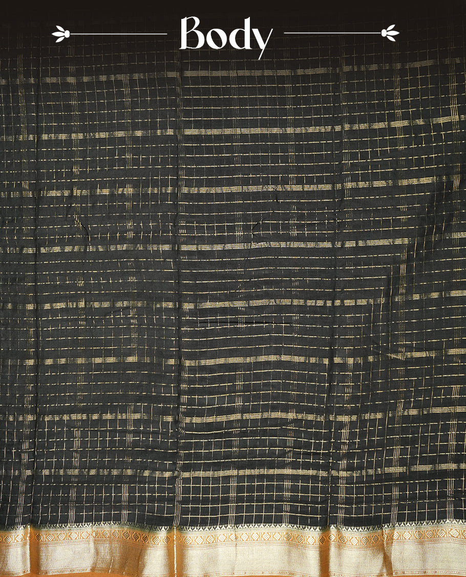 black colour mixed chanderi cotton saree with golden checkered body, mustard orange pallu with golden zari border, matching blouse.