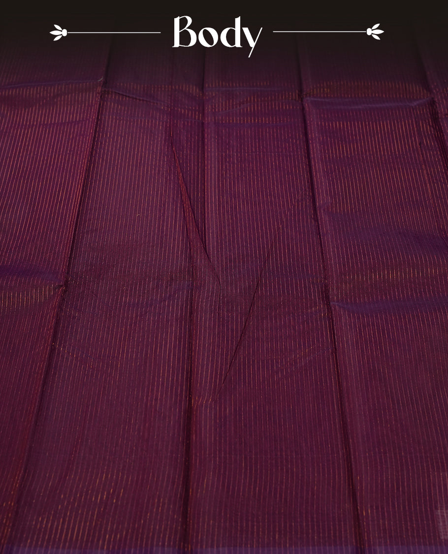 Grape colour silk cotton saree featuring with full of delicate vertical copper zari lines on the body & rich green colour pallu, Crafted without a border for a classy touch, Comes with a matching blouse for a perfectly coordinated look.