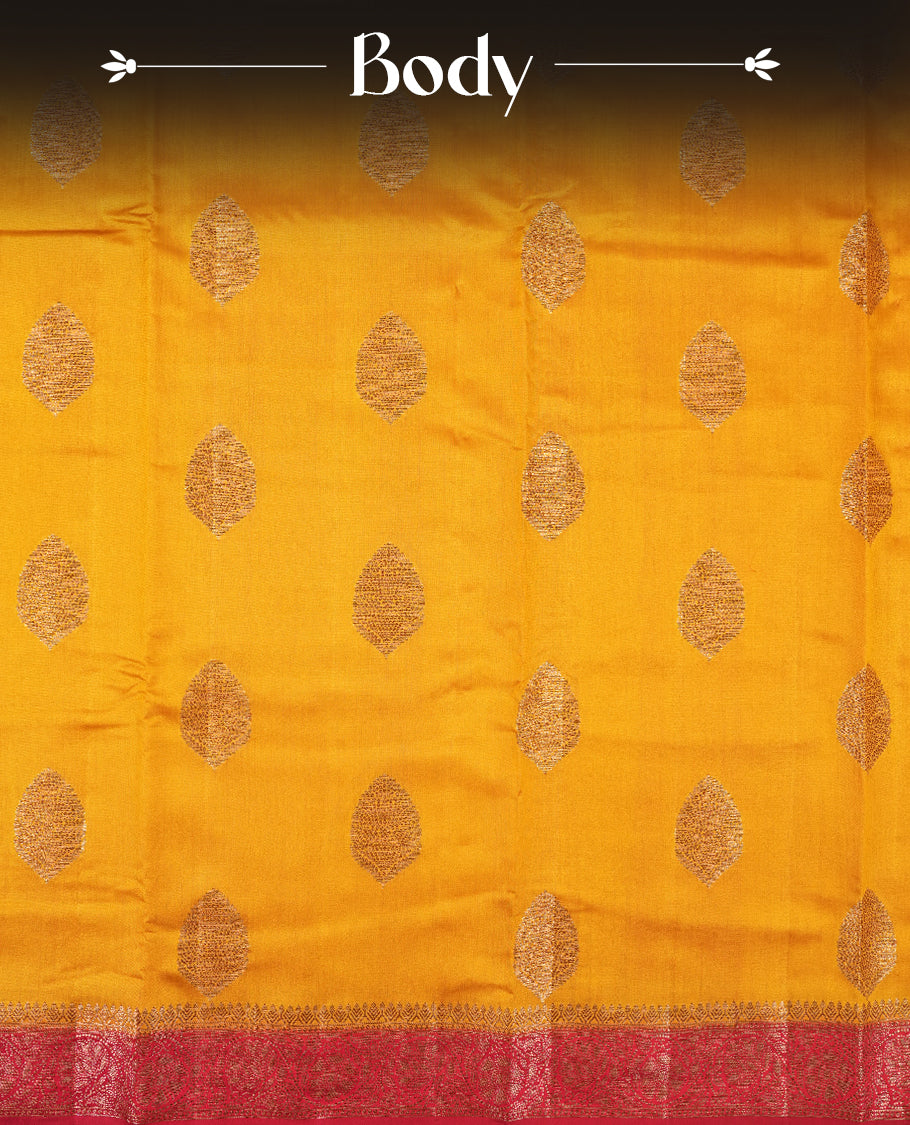 Golden Yellow Colour Banaras Soft Silk Saree with Gold Zari Oval Textured Buttas, Simple Decorative Pallu Border, Grand Pallu with Ornate Circular and Foliate Motifs in Red and Gold Tones, and Matching Red Blouse.