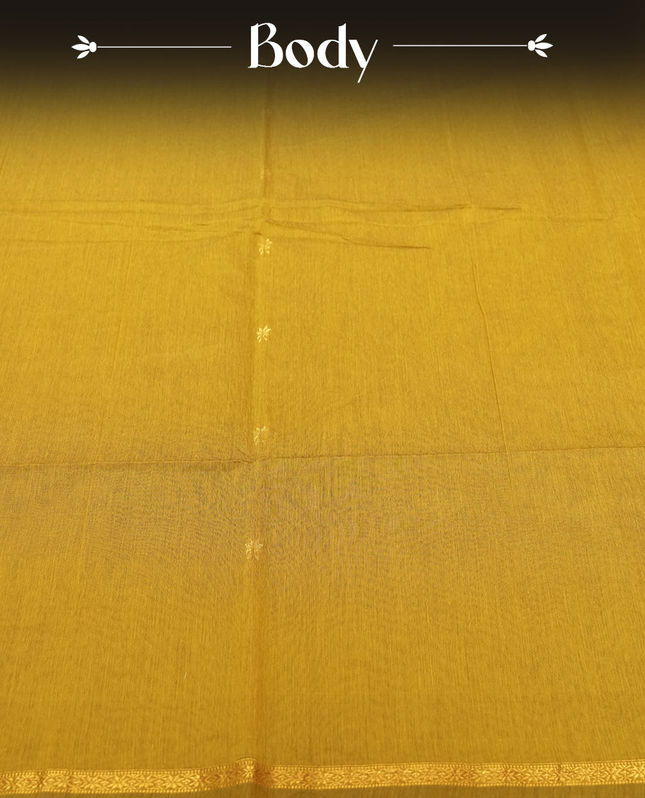 Mustard Yellow and Royal Blue Colour silk cotton saree with tiny zari star buttas, blue pallu with pinstripes and scattered buttas, slim antique-gold borders, and a plain blue blouse with matching zari edging.