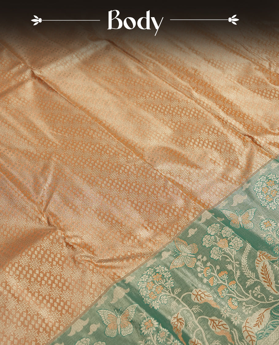 Saffron colour and Antique gold Zari Tissue Brocade Saree features intricate floral Motifs on body and fancy border & pallu with floral patterns, paired with matching blouse
