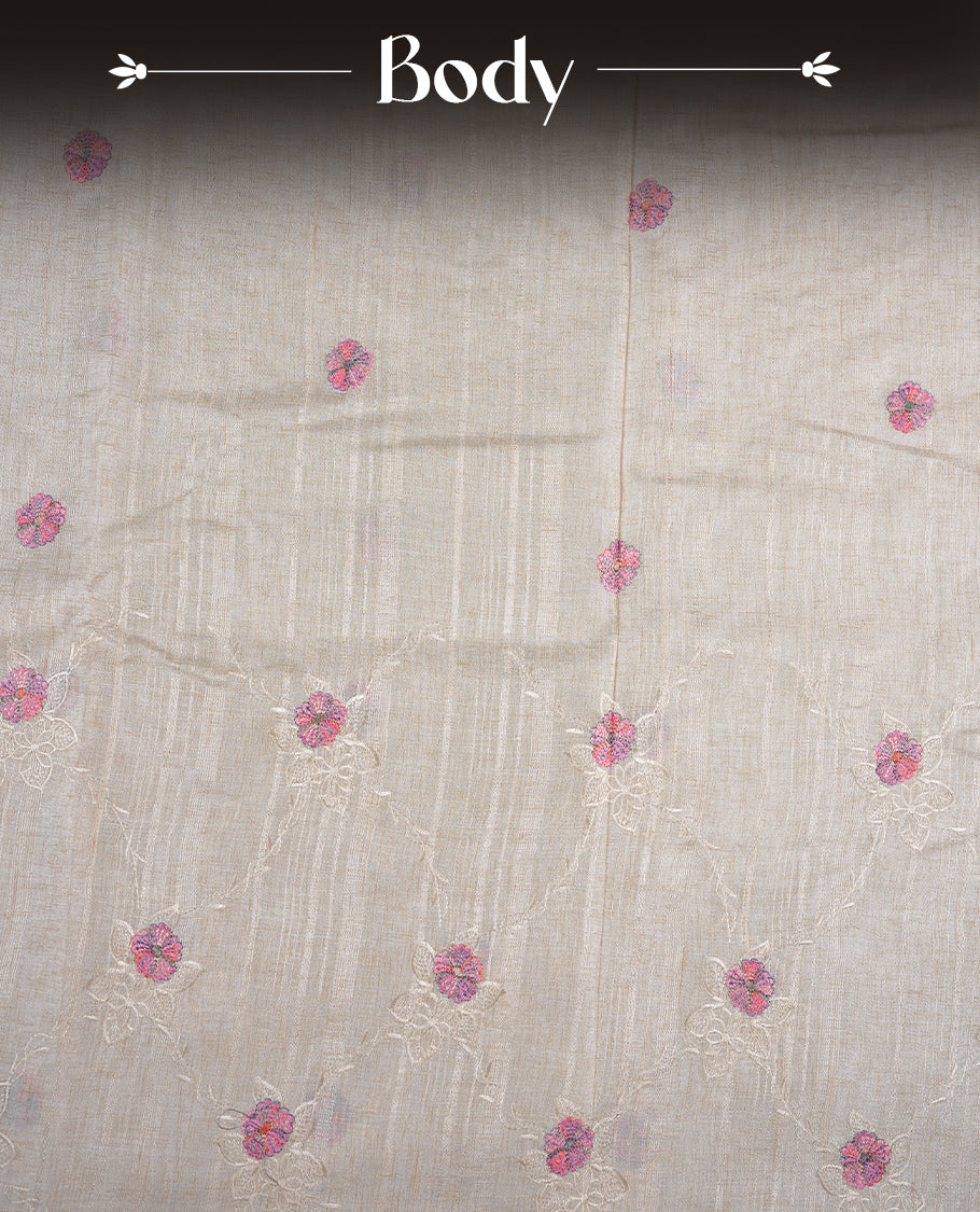 Cream colour semi tuseer silk saree featuring with Self colour thread embroidery kodi pattern & Pink colour floral thread motifs all over body, pallu, and paired with matching blouse piece.