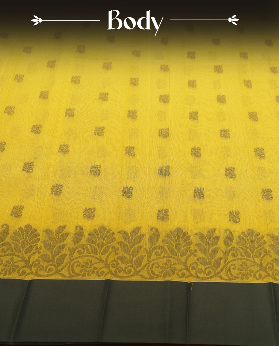 Lemon yellow colour silk cotton saree featuring elegant floral zari motifs on the body, complemented by a rich contrast dark plain border and pallu with traditional woven detailing & Comes with a matching blouse piece.