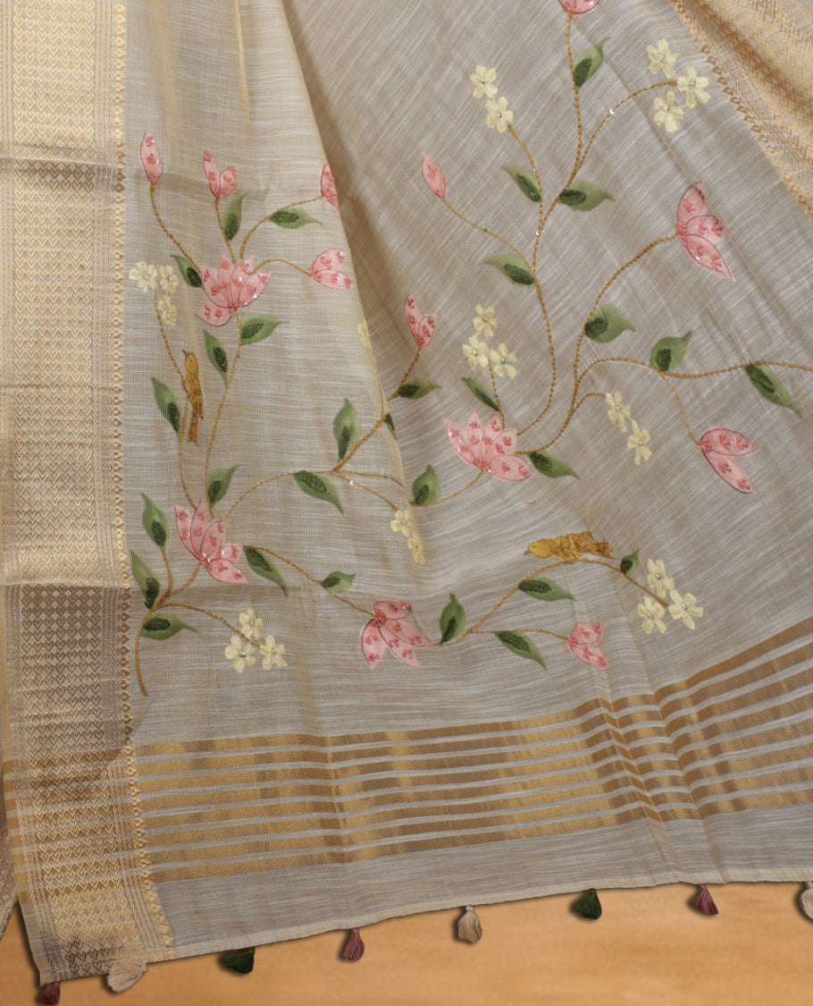 Beige colour Banarasi linen silk saree featuring hand brushed colour with Floral & birds printed pattern on body, gold zari woven geometric design border with self colour pallu and comes with a matching blouse