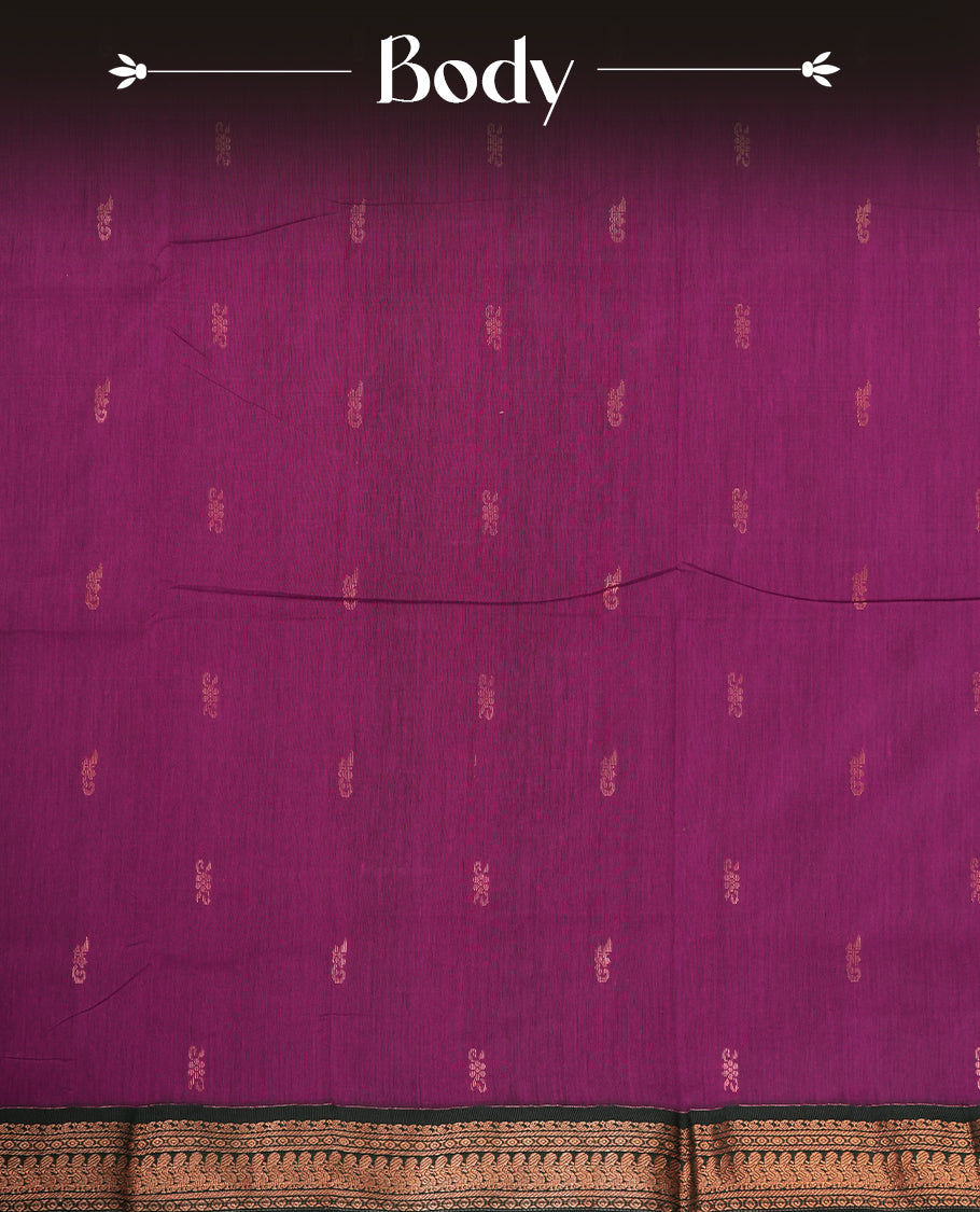 Purple colour Kalyani cotton saree with intricate small motifs all over, paired with a contrasting dark green rich zari woven border and rich peacock worked pallu & Comes with a matching blouse piece