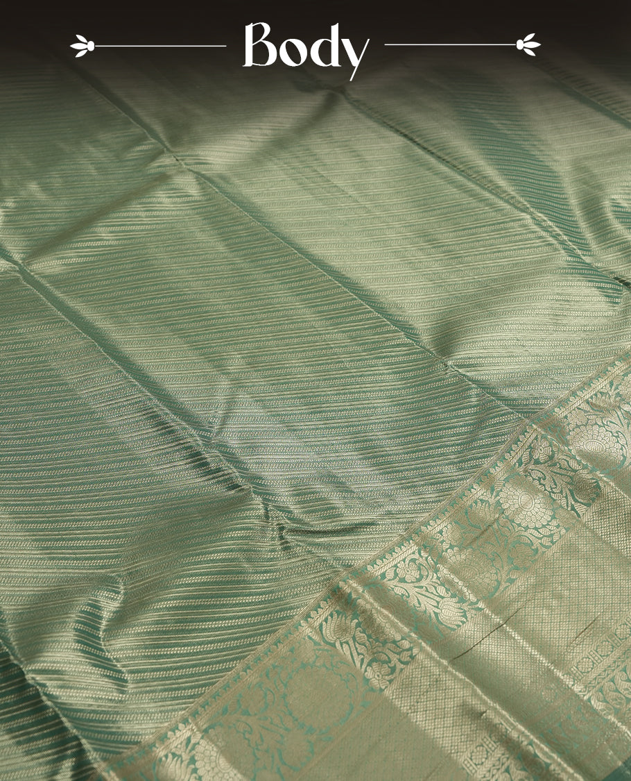Green colour and Antique gold Zari Tissue Brocade Saree features intricate line Motifs on body and traditional border & pallu , paired with matching blouse