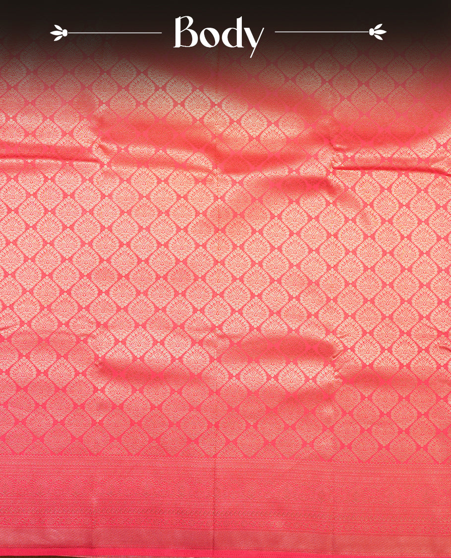 Watermelon colour semi silk brocade saree featuring intricate Gold butta patterns across the body, complemented by a rich self colour woven border and pallu, paired with a matching blouse.