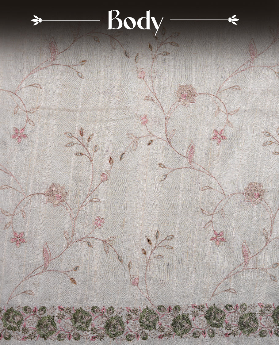 Cream colour semi tusser silk saree featuring with Green colour thread embroidery kodi pattern all over body, pallu, border and paired with matching blouse piece.