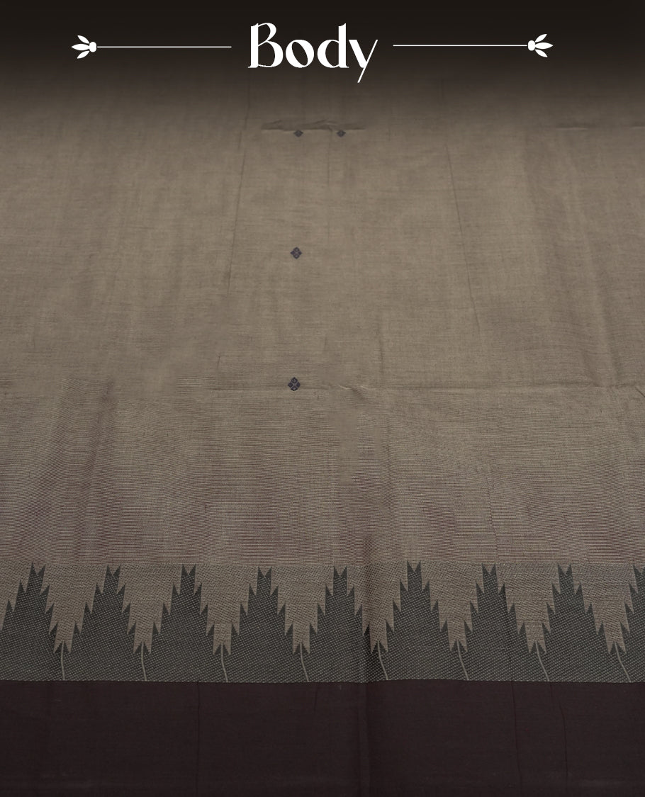 Black & Grey colour Chettinad cotton saree featuring subtle threadwork and bold black temple motifs on the border, woven in fine cotton for everyday elegance & Comes with a matching blouse piece for a traditional look.