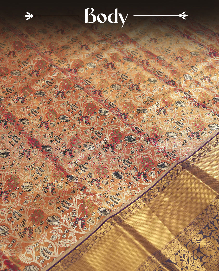 Golden colour and Antique silver Zari Tissue Brocade Saree features intricate a coloured floral Motifs on body and traditional border & pallu with floral patterns, paired with matching blouse