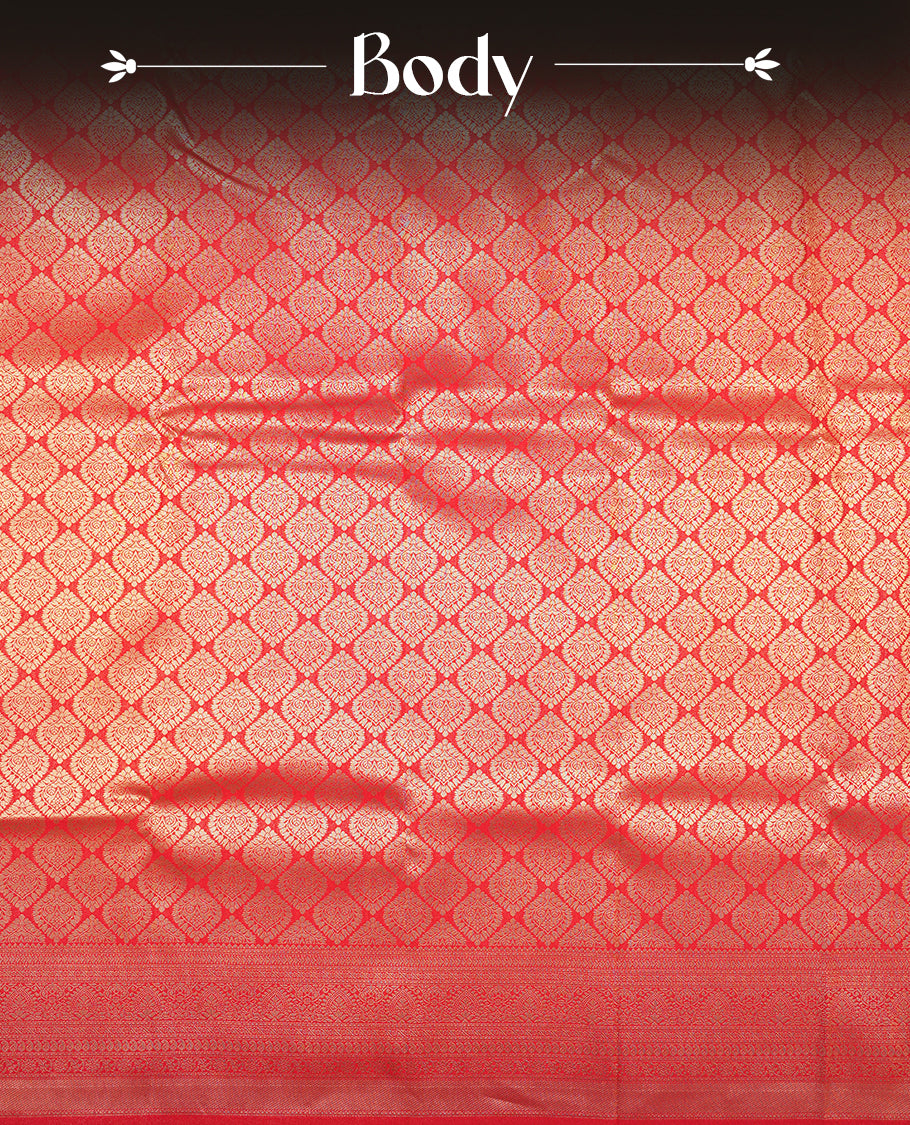 Red colour semi silk brocade saree featuring intricate Gold butta patterns across the body, complemented by a rich self colour woven border and pallu, paired with a matching blouse.