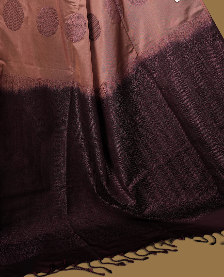 Mavue brown colour semi soft silk saree, beautifully designed with woven circular motifs & The look is enhanced by a rich contrast dark chocolate brown border and pallu, paired with a matching blouse.