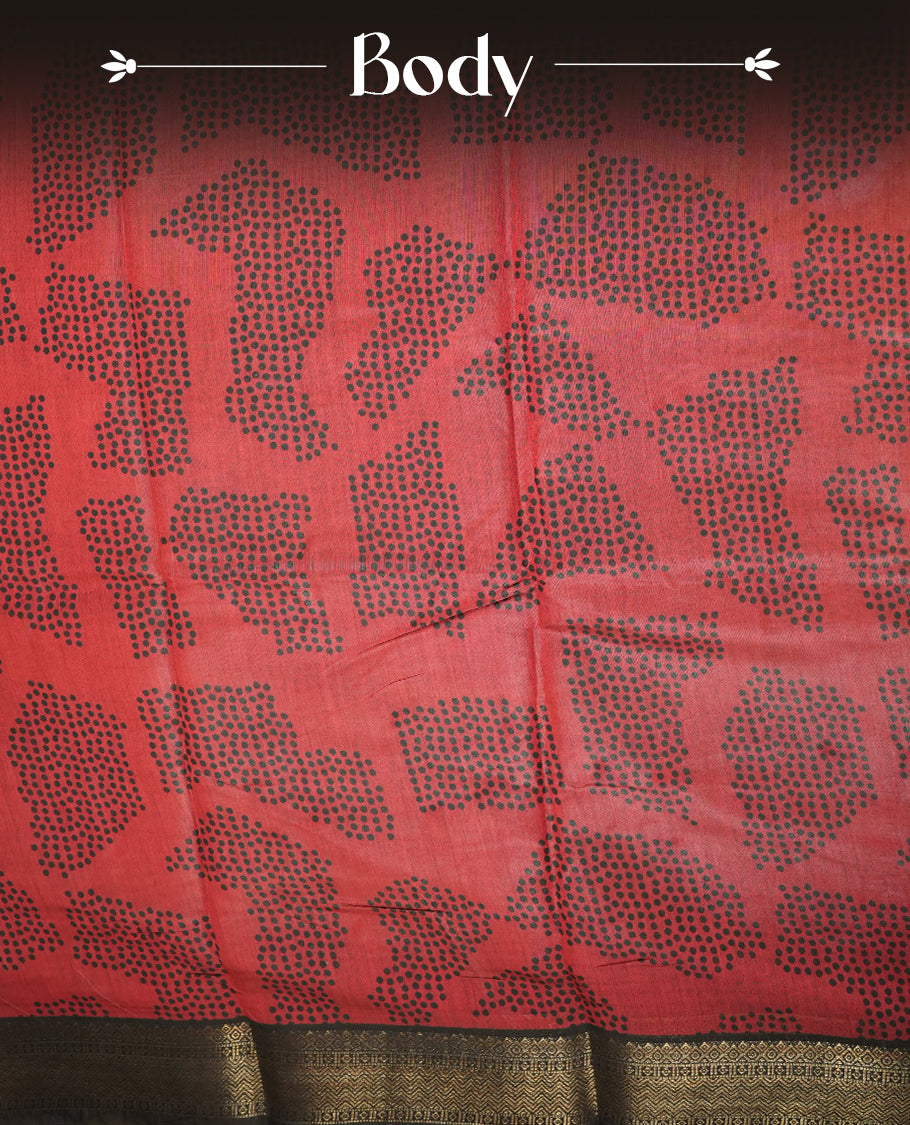 Coral red colour mixed chanderi cotton saree featuring black dot printed body, striped pallu with black and red geometric patterns, golden zari border, and matching blouse