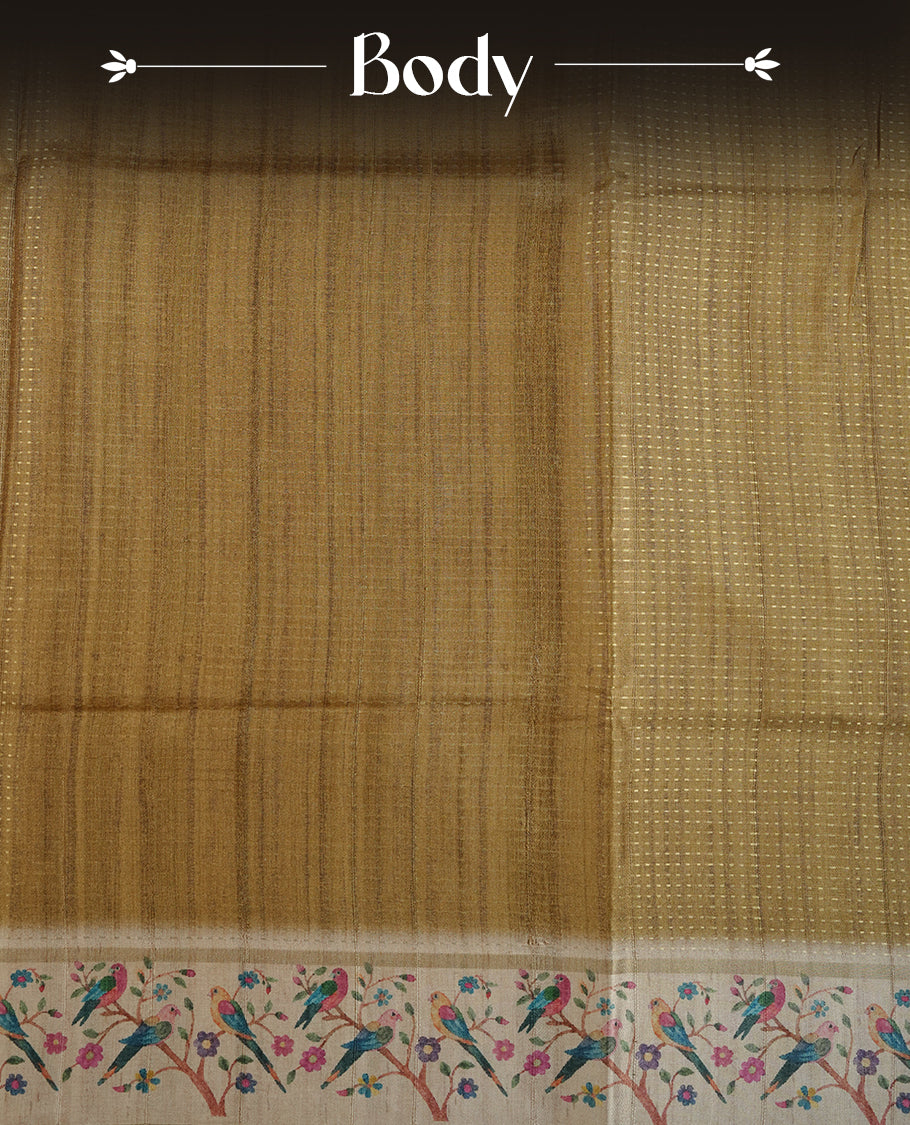 Olive colour tussar saree featuring golden zari dot stripped pattern on the body, complemented by a contrast cream colour mutlicolour floral kodi & animal print on border & pallu, paired with a matching blouse.