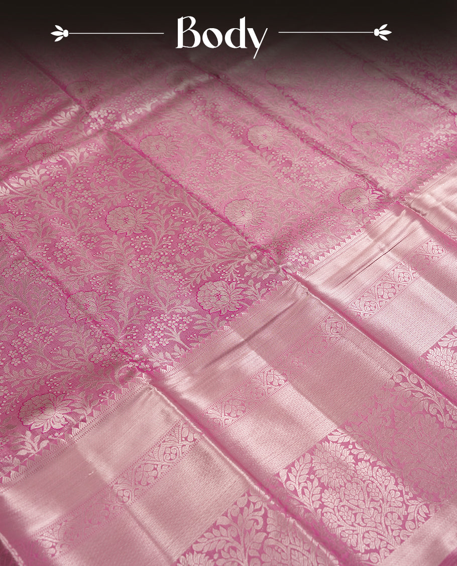 Pink colour and Antique silver Zari Tissue Brocade Saree features intricate floral Motifs on body and fancy border & pallu with floral patterns, paired with matching blouse