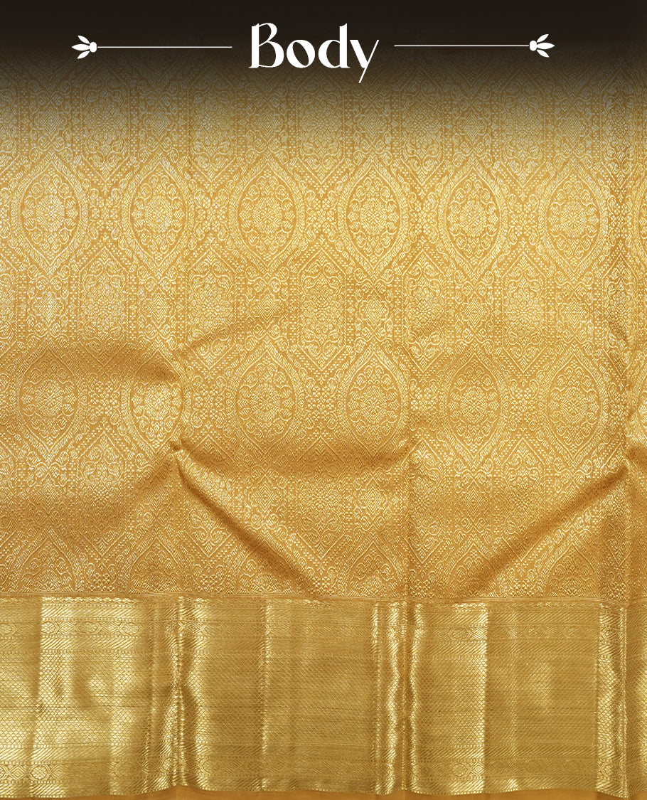 Gold colour Kanchipuram Samudrika Silk Saree featuring patterns weaving with gold zari jacquard and a traditional zari border, paired with a matching designer jacquard blouse piece