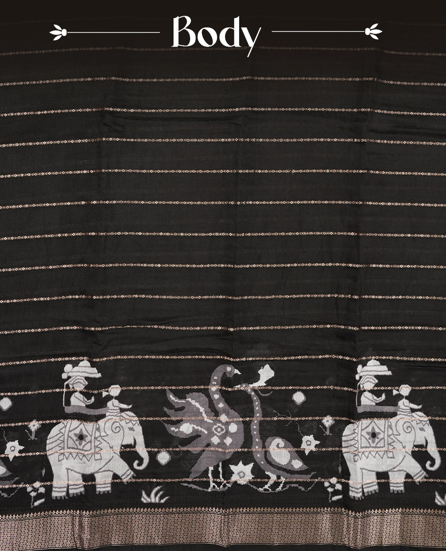 Black colour chanderi silk saree with gold zari strip pattern On body, compilmented by self colour border with antique zari pattern & white animal print pattern and a matching blouse.