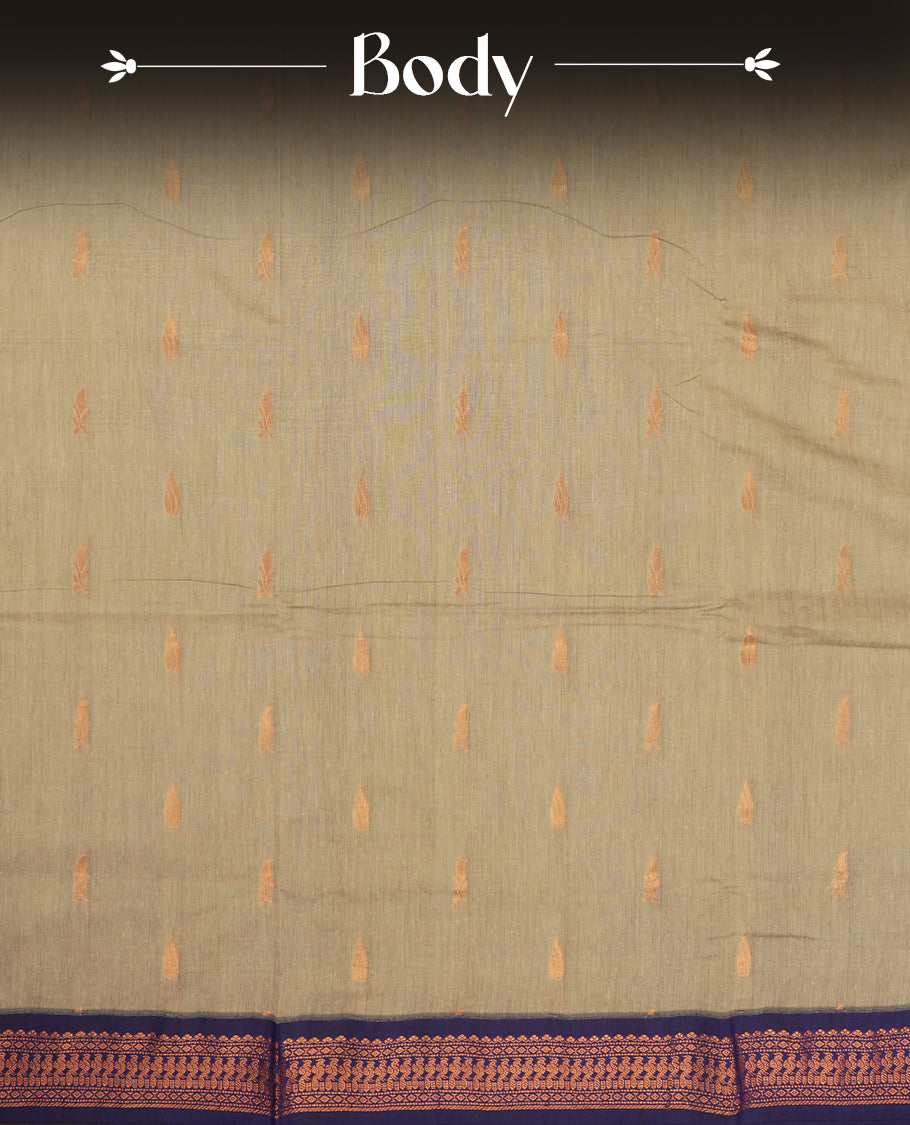 Grey colour Kalyani Cotton saree with royal blue border and pallu, adorned with copper zari motifs and intricate weaving & Comes with a matching blouse piece.